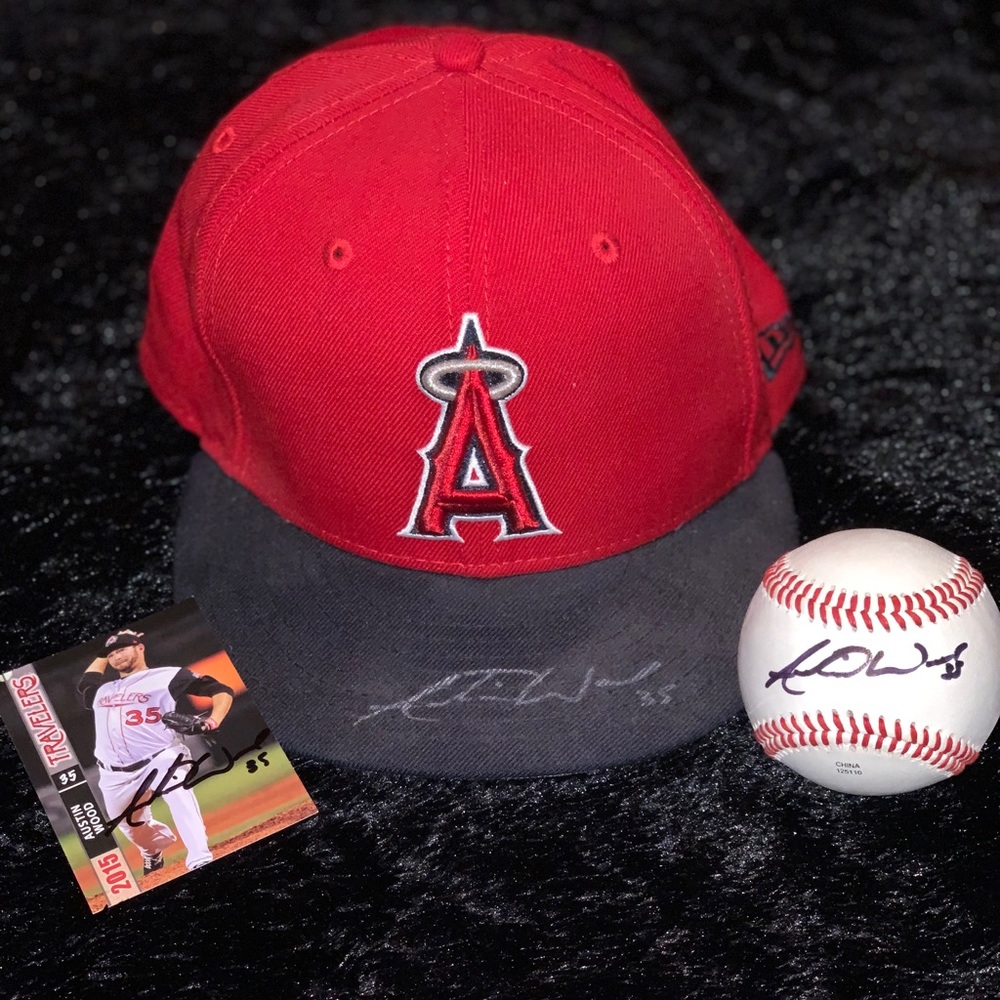 | Autographed Hat/Ball/Card by MLB Angels Pitcher